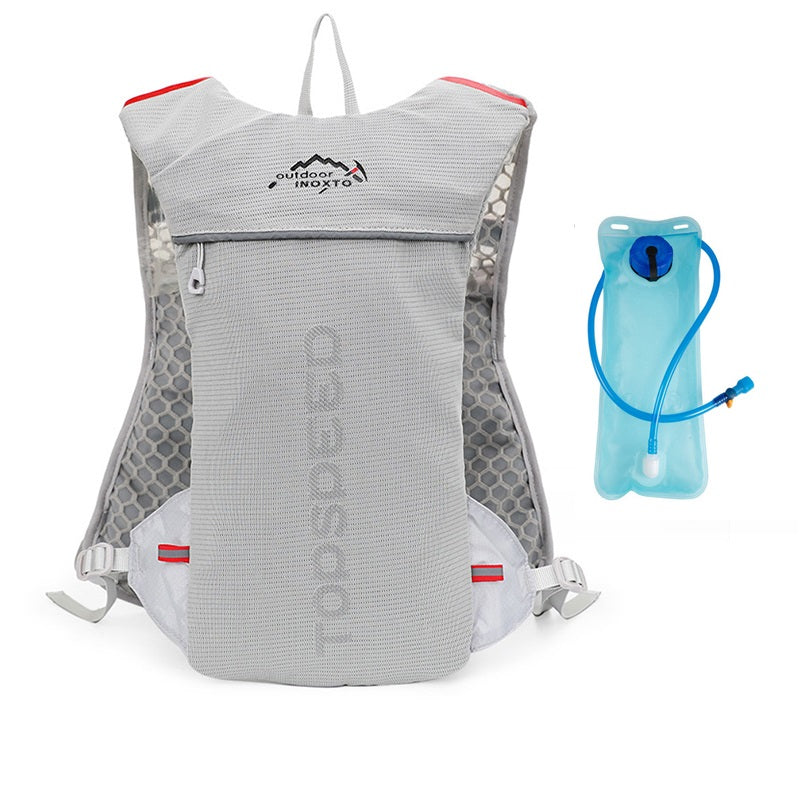 Sac dos randonnée avec poche eau gris